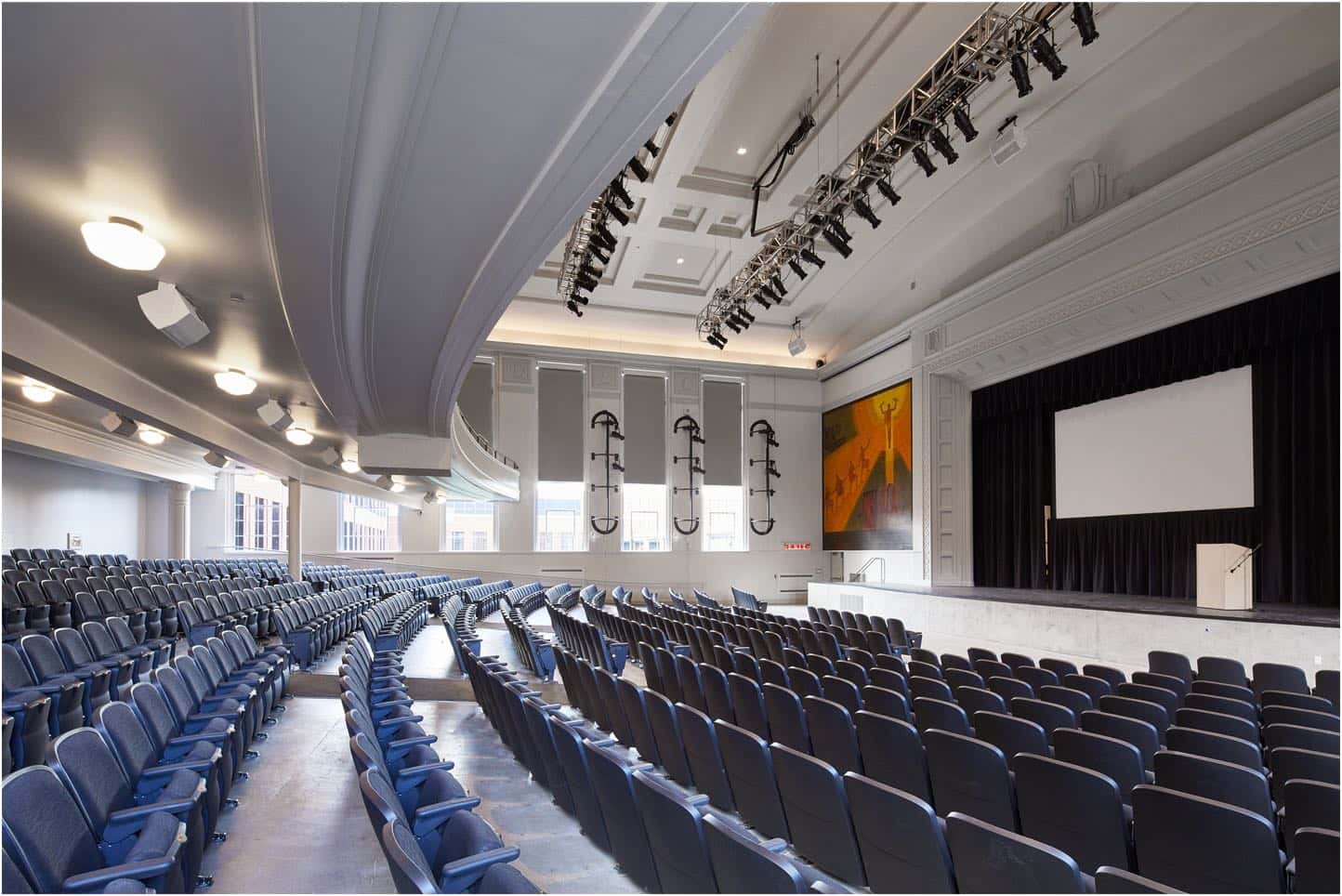 The auditorium at Grant High School in Portland, OR features modern electrical installations, including advanced lighting and rigging equipment.
